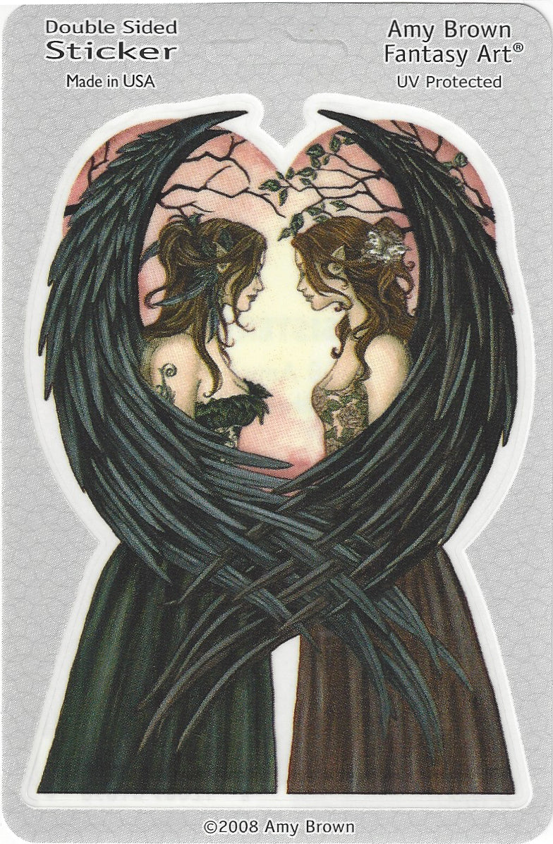 Amy Brown Fantasy Art double-sided sticker featuring two winged female figures facing each other inside a heart-shaped frame, printed on a gray backing card with product text.