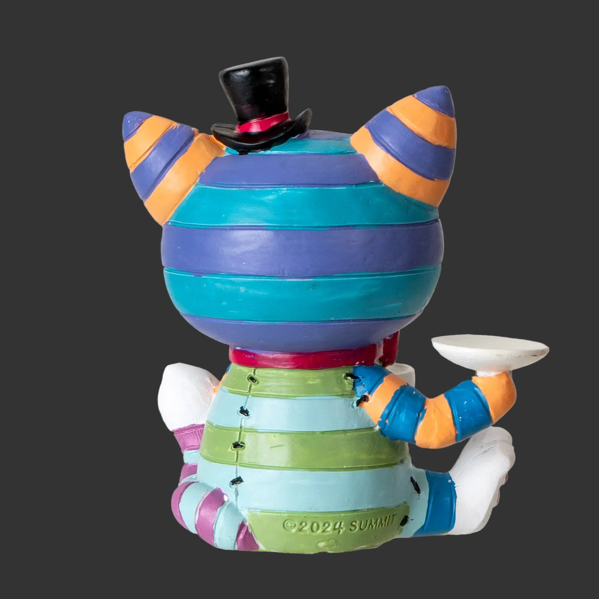 Colorful striped furrybones Chesire Cat  skeleton figurine with a top hat on a black background