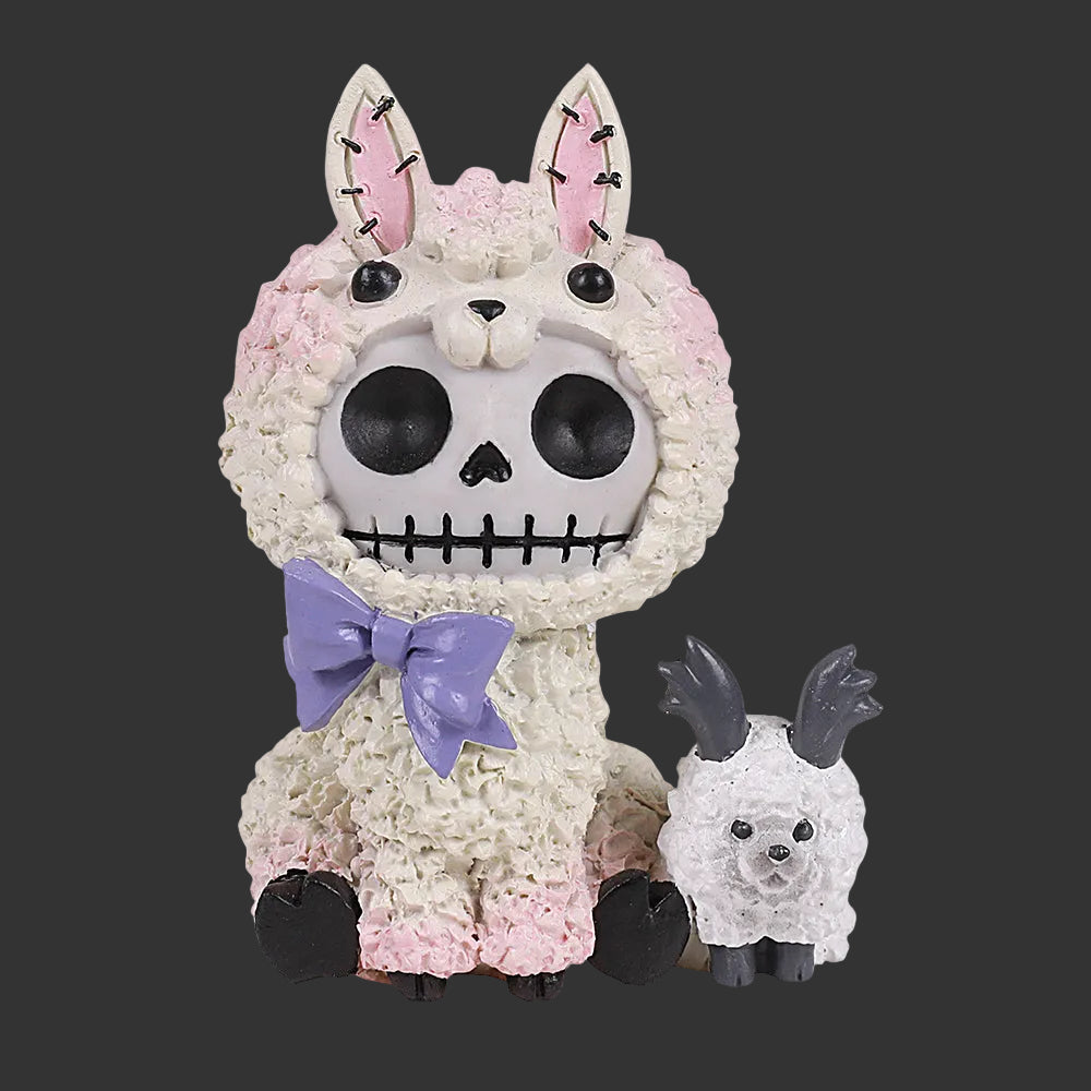 Llama-shaped Furrybones resin figurineswith skeleton face and purple bow on a black background with a little white lamb