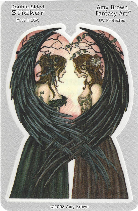 Amy Brown Fantasy Art double-sided sticker featuring two winged female figures facing each other inside a heart-shaped frame, printed on a gray backing card with product text.