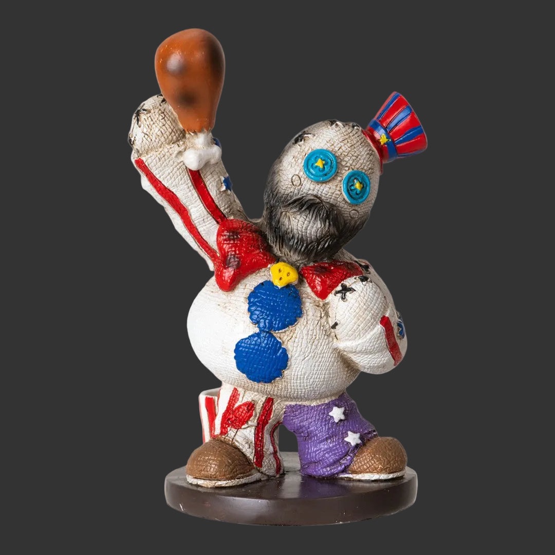 Colorful Pinhead Monster Captain Spaulding figurine with a bow tie and a stick on a black background