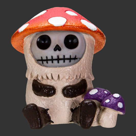 Furrybones Skull figurine with a red mushroom cap and purple mushroom with white spots on a black background