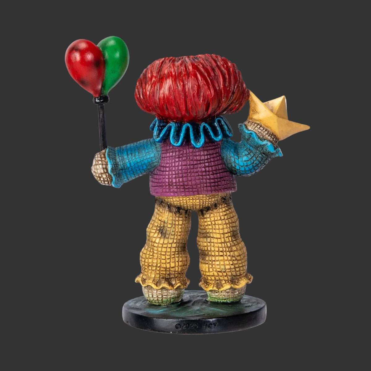 Pinhead Monster horror character OG Pennywise with balloons and a crown on a black background