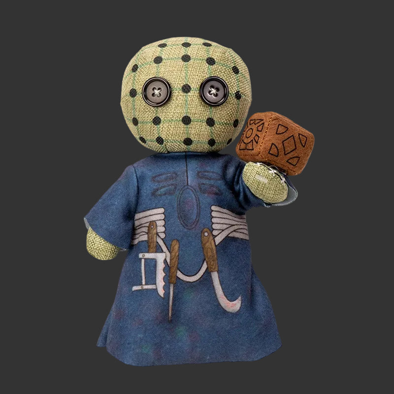 Stuffed Pinhead Monster plush of Pin from Hellraiser with a polka dot head and blue outfit on a black background