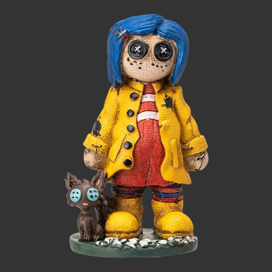  Pinhead Monster figurine of Coraline reimagined with button eyes, blue hair, yellow raincoat, and a small black cat companion on a black background