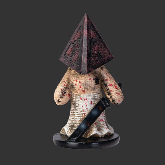 Pinhead Monster Pyramid Horror Figurine with pyramid-shaped head and sword on a black background