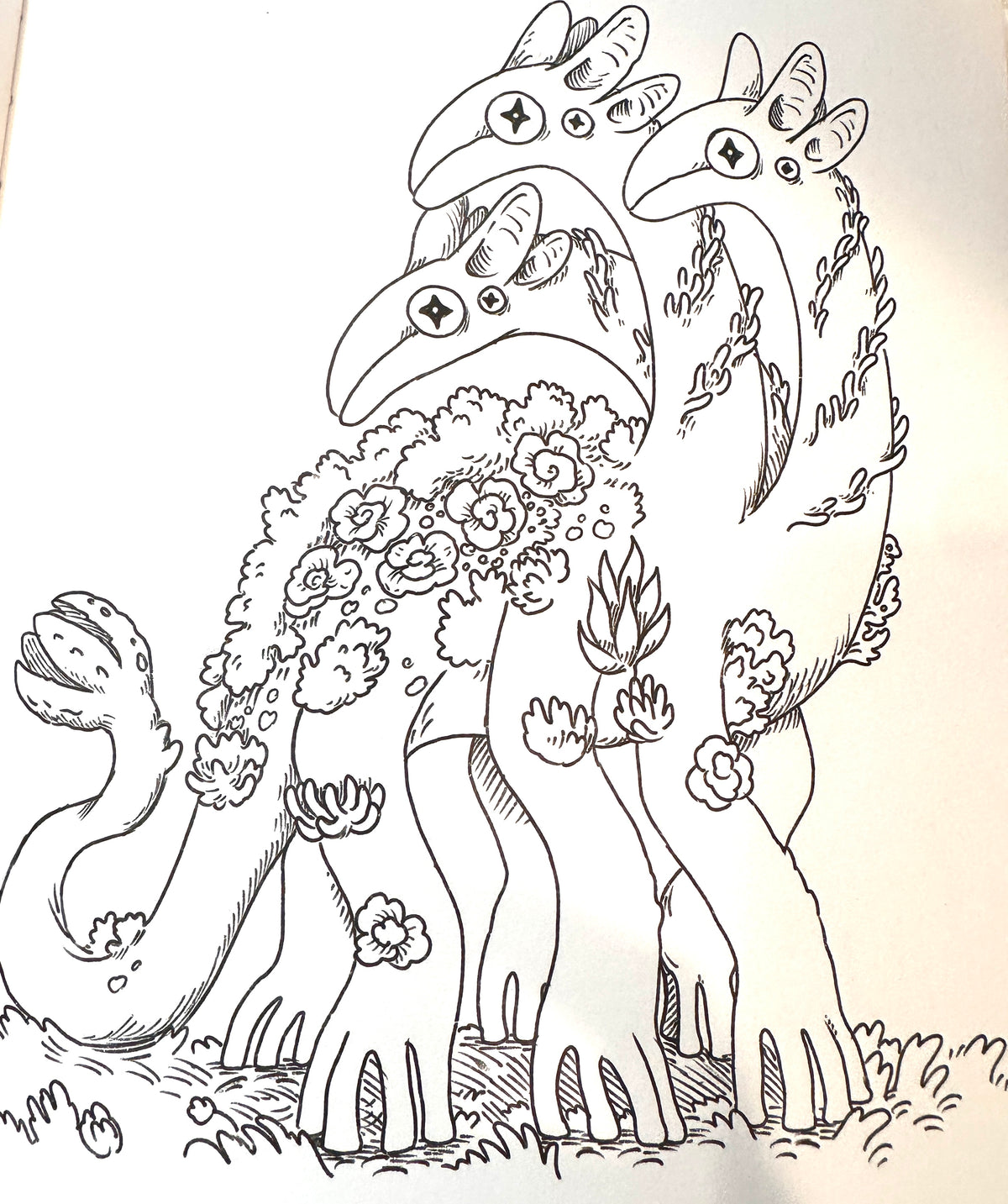 Black and white line art illustration of three stylized bird-like creatures with floral details, shown on a plain white background.